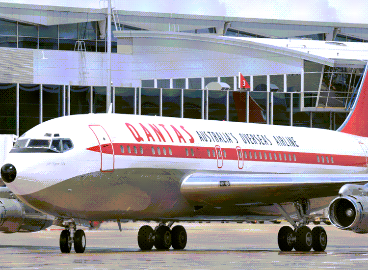Front end of a 1960s Qantas Boeing 707 sitting on the tarmac